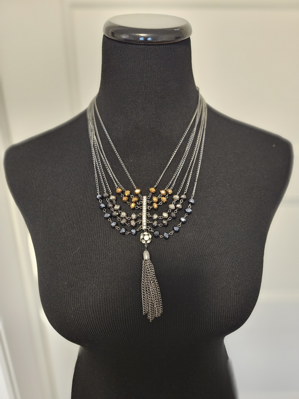 Multi-Strand Black and Gold Bead Tassel Necklace